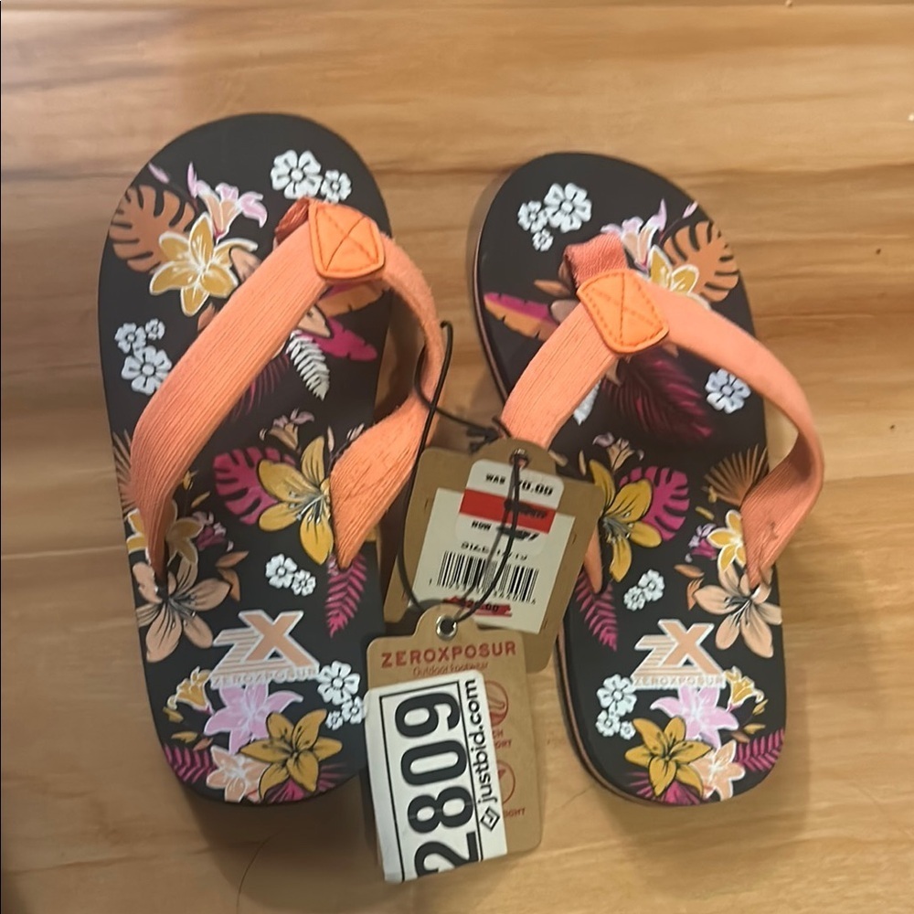 ZeroXposur Orange and Black Flip Flops Vibrant Style